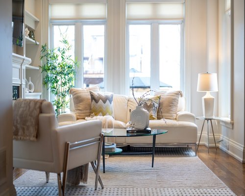 A clean living room setup showing space for light stretching